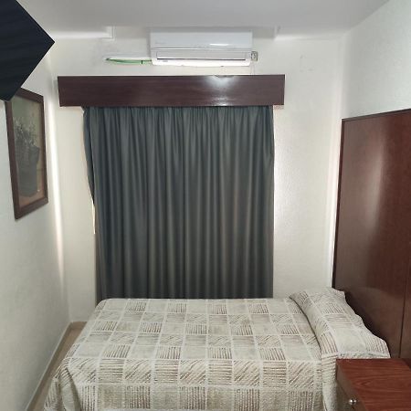 เอ็น.ซีเอช Hotel ตอร์เรโมลิโนส ภายนอก รูปภาพ